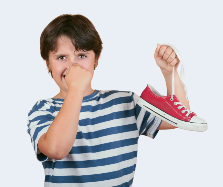 Kid holding smelly red sneaker